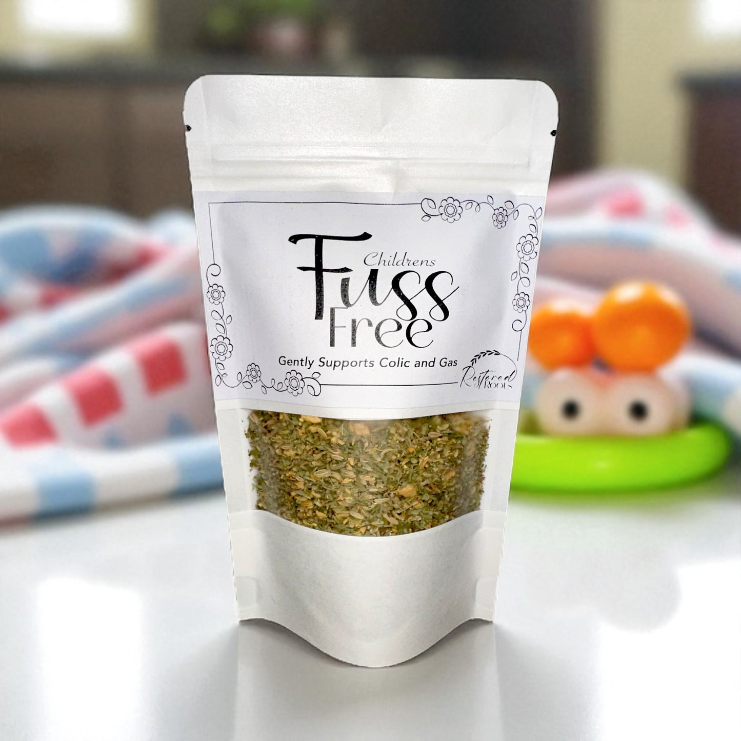 Packaged product labeled 'Children's Fuss Free' on a neutral background